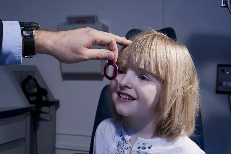 At what age should children have their first comprehensive eye exam?